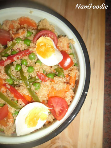 warm quinoa salad bowl half