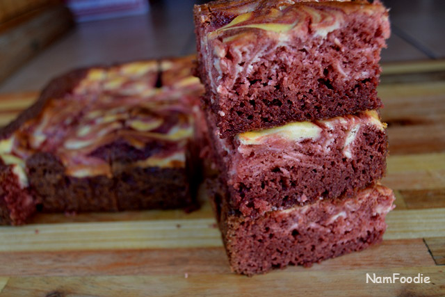 Red velvet cheesecake swirl brownies slices blur